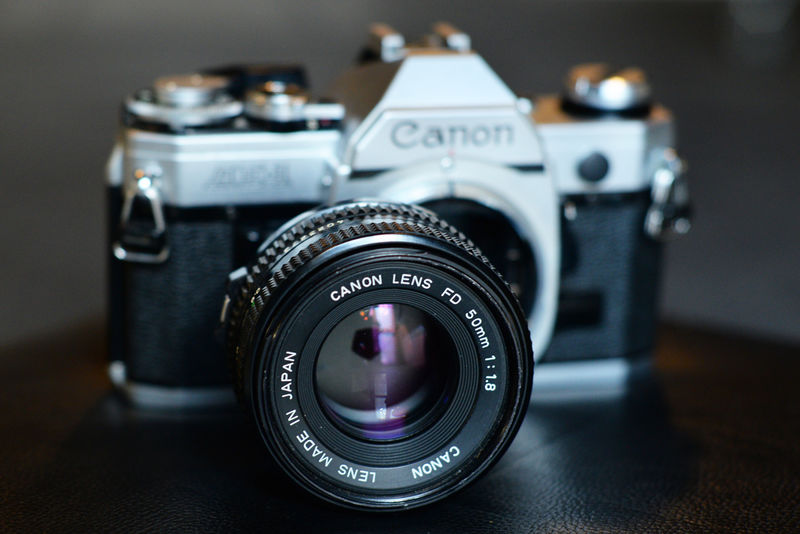Canon AE-1 Avec Objectif FD 50mm F/1.8 – Power Winder A & Speedlite 155A – Occasion