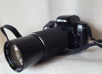 Nikon F-50 + Sakar 75-300/5.6 Macro++