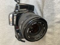 фотоапарат minolta dynax 5000i с обектив exakta 70-210 1.4 -5.6 mc macro