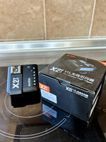 TTL радио синхронизатор Godox - X2TN, за Nikon