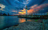 lighthouse on the pier at sunset ; comments:3